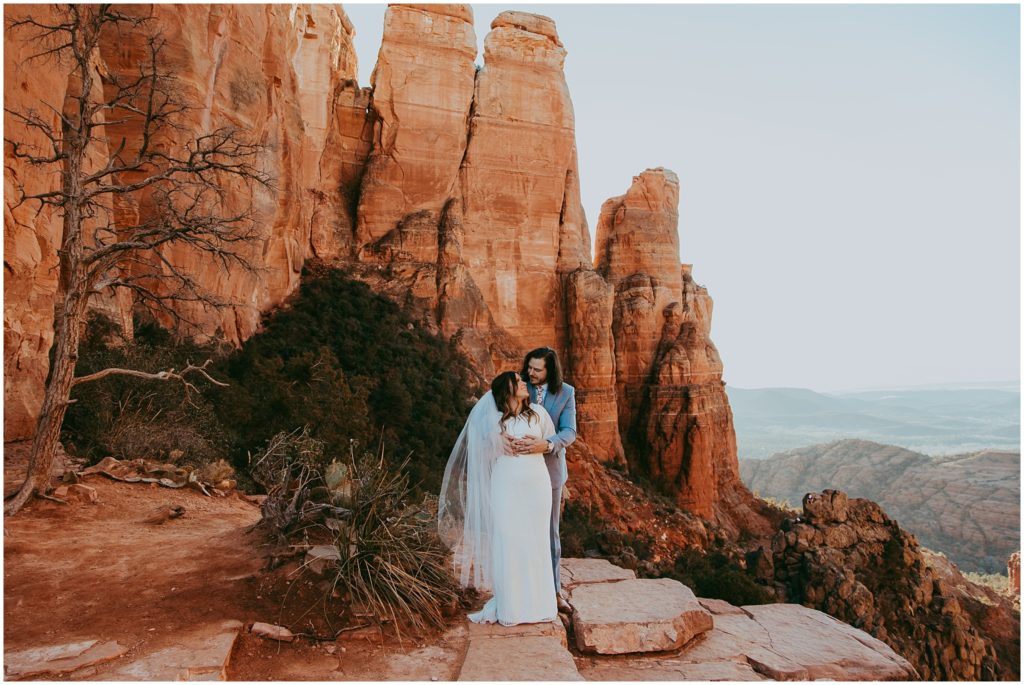 Cathedral Rock bridal photos showing the couple emrbacing