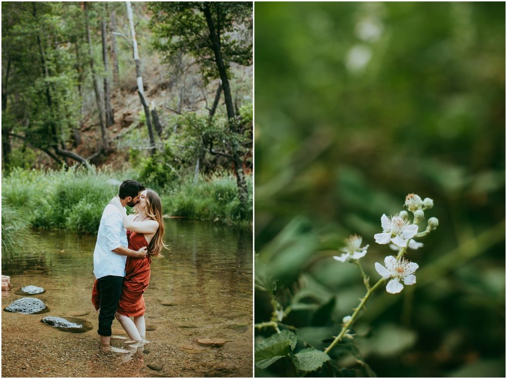 man and woman not wearing shoes stand in clear oak creek water while kissing and holding each other in their arms