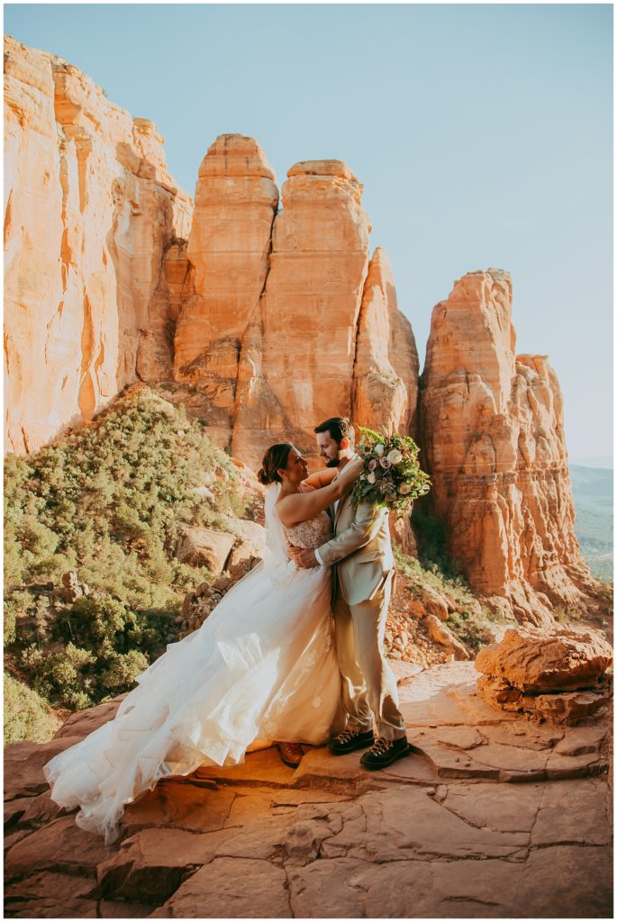 bride and groom on Cathedral Rock cliffs