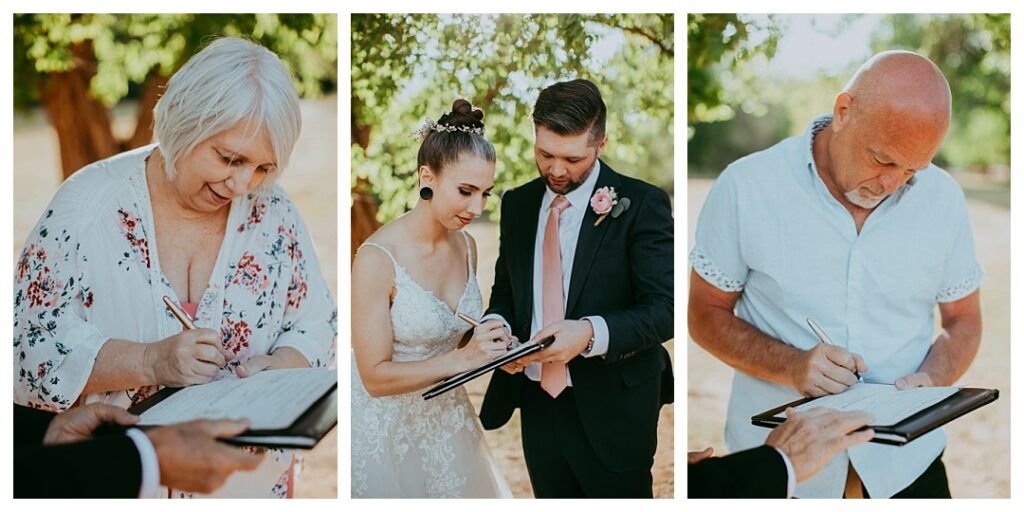 Bride, groom, and witnesses sign marriage license at Arizona wedding