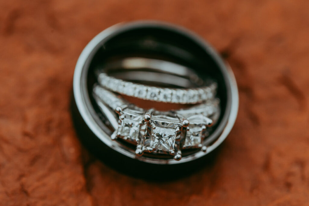 a detailed shot of an engagement and wedding rings for Sedona engagement photos