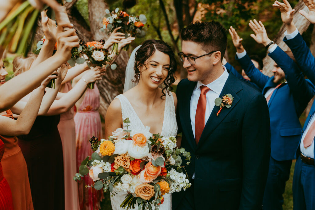 bride and groom smiling together for photos