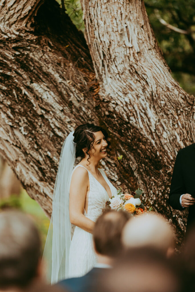smiling bride during ceremony