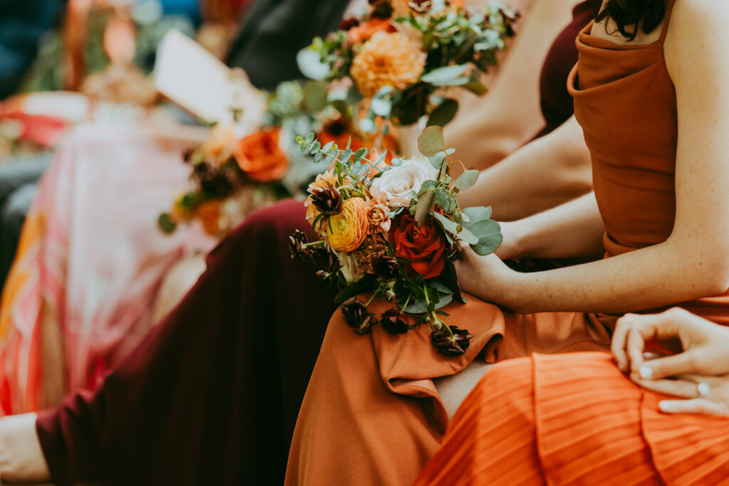 bridesmaid flowers being held