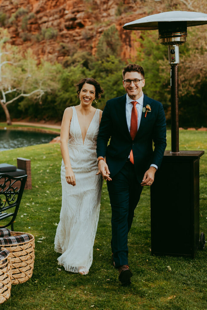 couple entering their reception at los lagos estate