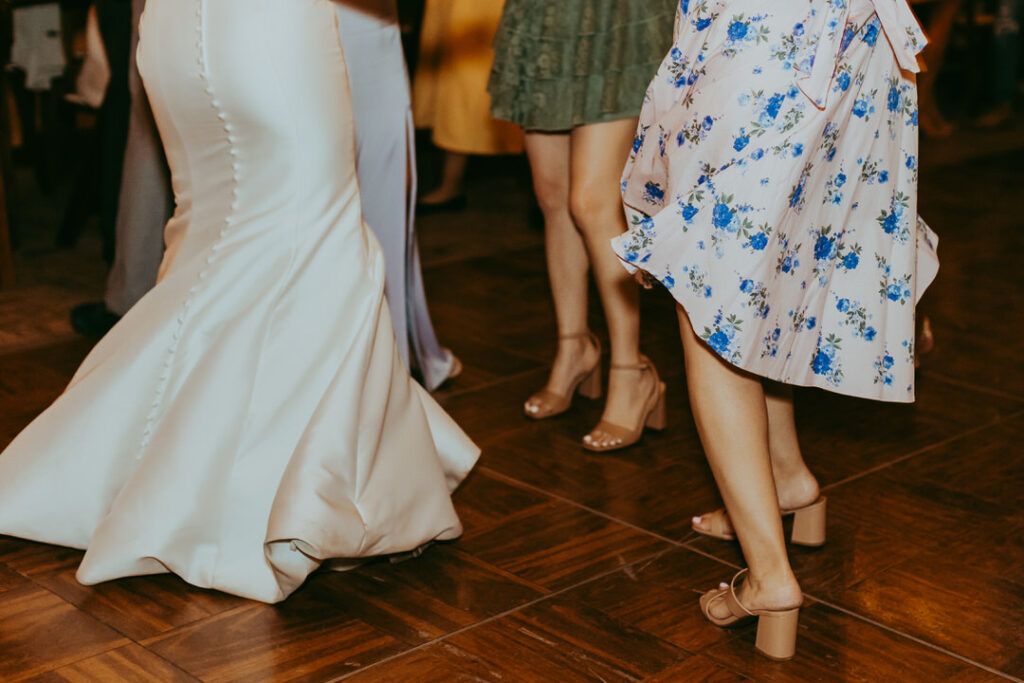 guests and bride dancing on dancefloor