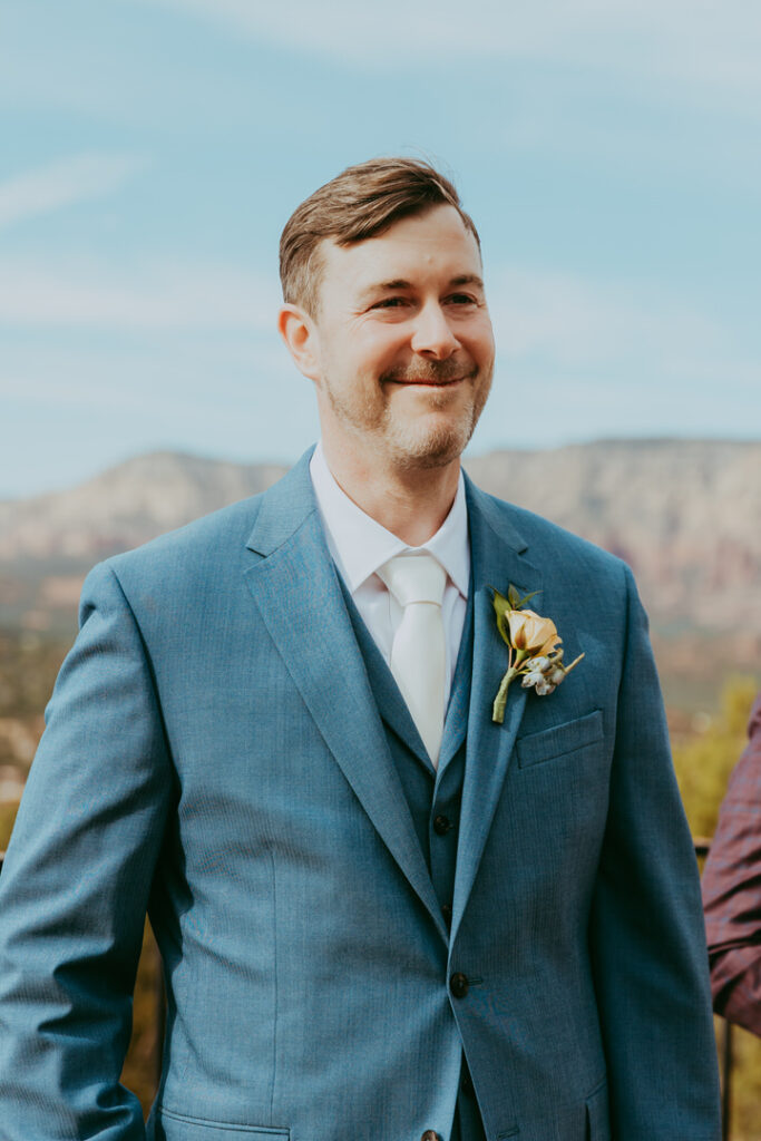 groom seeing his bride for the first time at a sedona wedding