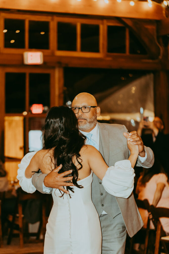 bride and dad dancing