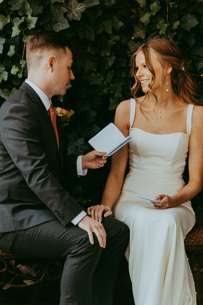 An intimate first look moment beautifully documented by an Agave of Sedona wedding photographer in the venue’s lush garden pathways.